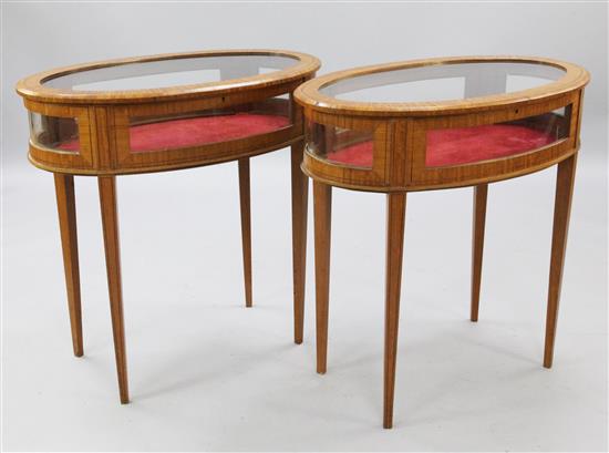 A pair of Edwardian style satinwood display tables, W.2ft 6in.